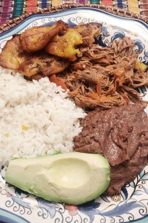 Avocado, rice, mashed beans and shredded beef-Nicaraguan Plate